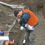 plumber with pipe